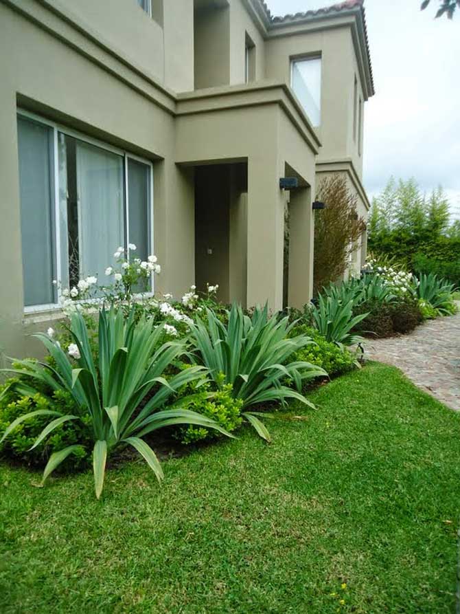 Jardín de entrada La bienvenida a la casa