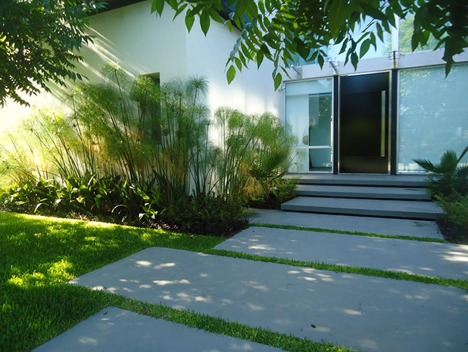 Jardín de entrada La bienvenida a la casa